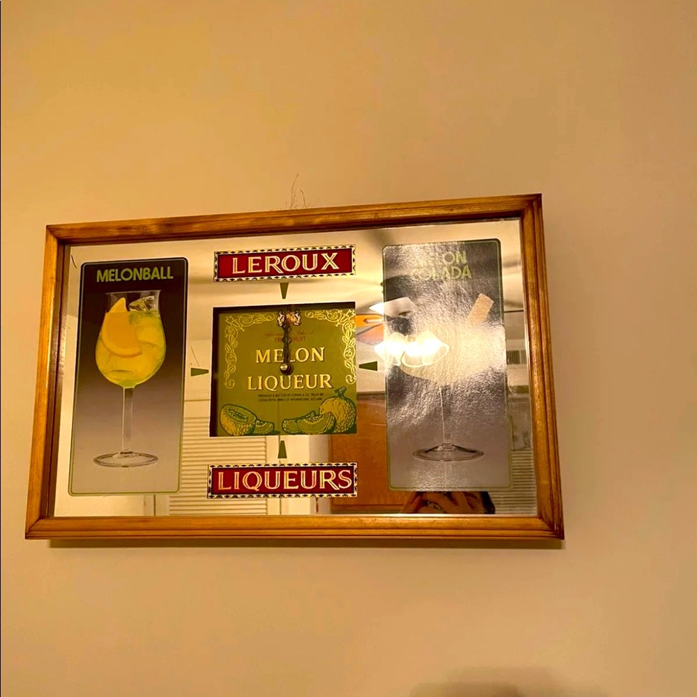 Leroux antique bar clock